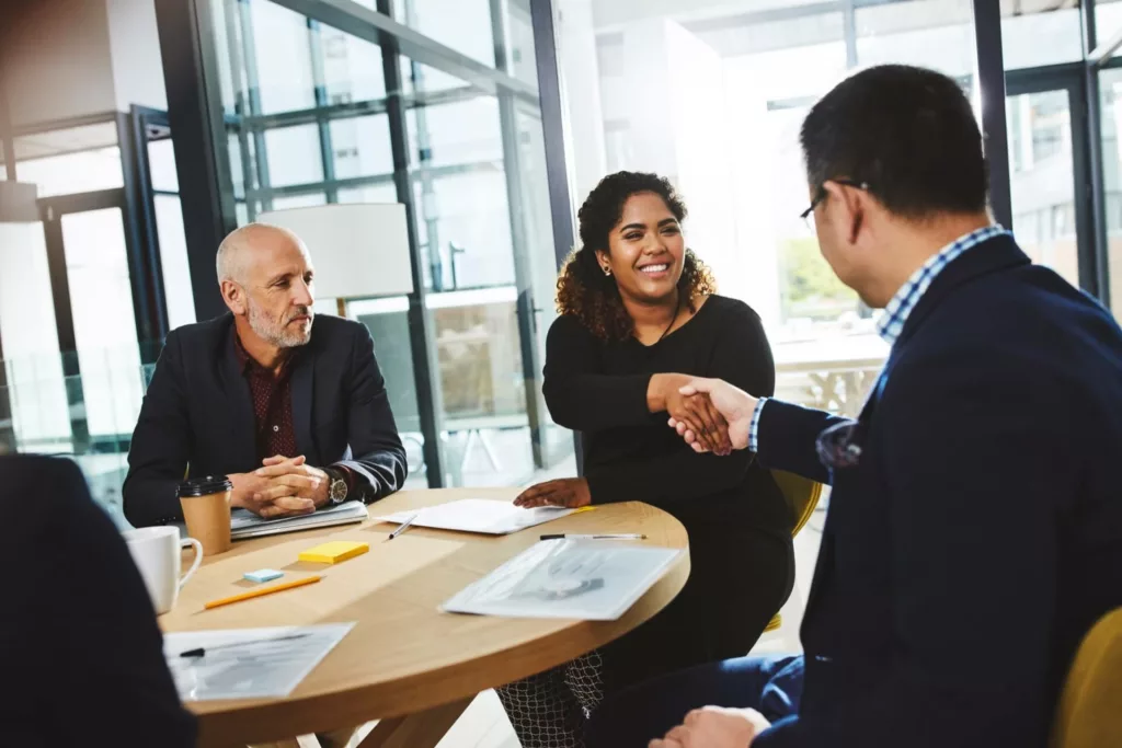 lease negotiation after a lease audit with landlord around a table
